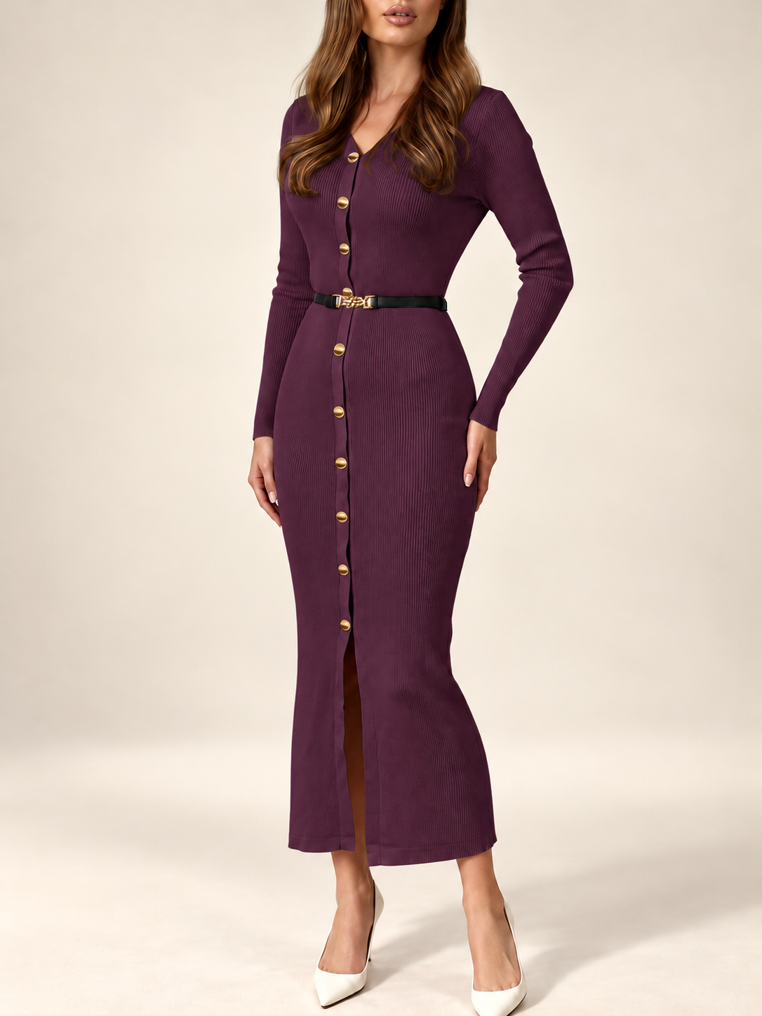 Purple ribbed knit midi dress styled with a black belt in an ivory studio