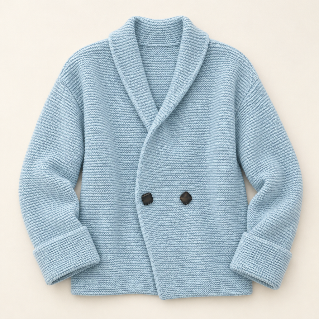 Overhead studio flat lay of the blue Camille knit cardigan with two dark statement buttons