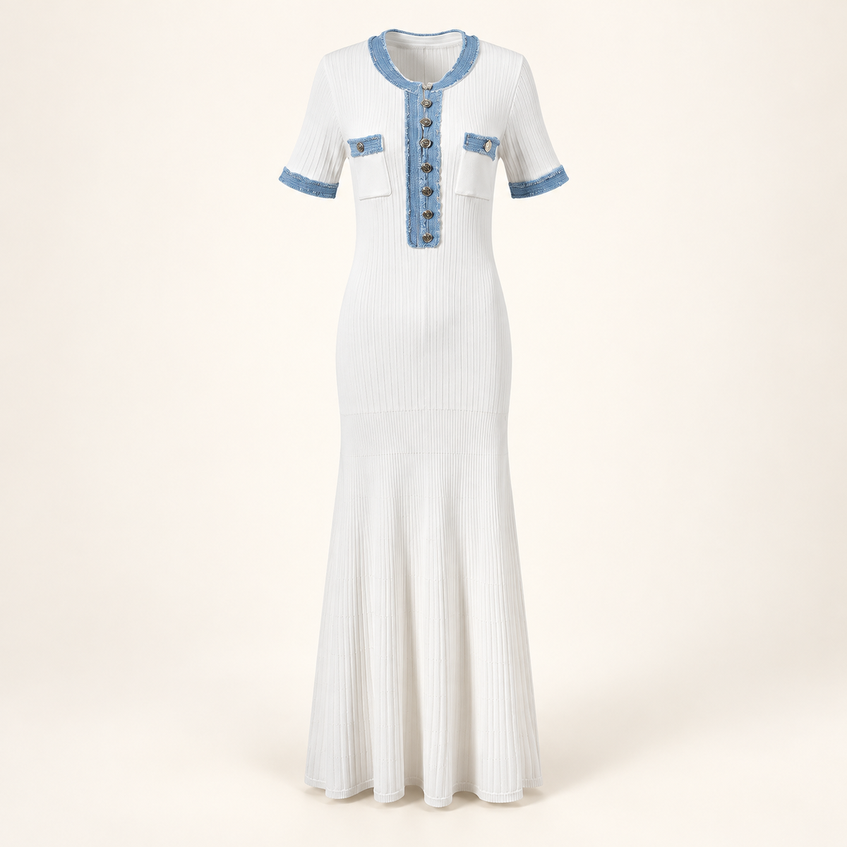 White short-sleeve ribbed knit dress with pale-blue trim in an ivory studio